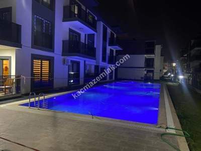 Kuşadası Davutlarda Havuzlu Sitede Satılık Daire 2+1 1