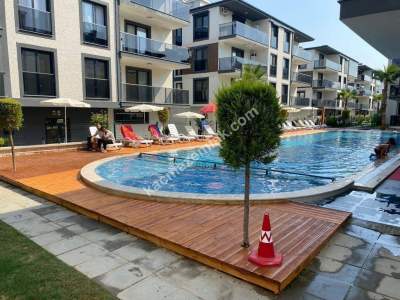 Kuşadası Davutlarda Havuzlu Sitede Satılık Daire 2+1 13