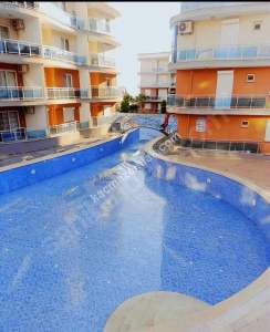 Kuşadası Değirmendere'de Eşyalı Satılık Daire 1+1 1