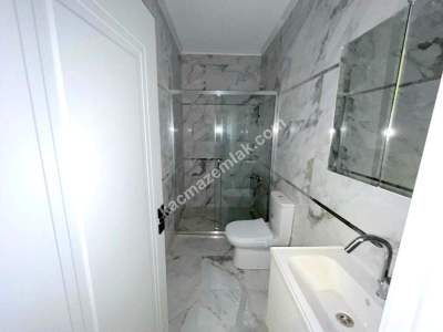 Kaçmaz'dan Sıfır Muhteşem Bahçe Teraslı Otoparklı 2+1 34