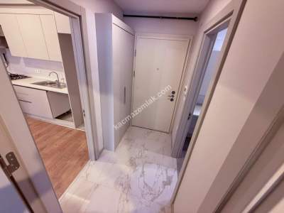 İdealtepe Sahilde Satılık 1. Katta Balkonlu 1+1 Daire 26