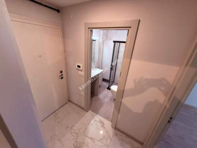 İdealtepe Sahilde Satılık 1. Katta Balkonlu 1+1 Daire 25