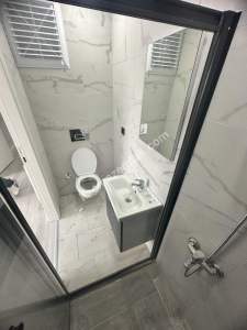 Kaçmaz'dan Dolayoba Ana Caddede Full Yapılı Sıfır 3+1 12